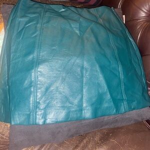 Aritzia Babaton vegan leather mini skirt in green in size 6.